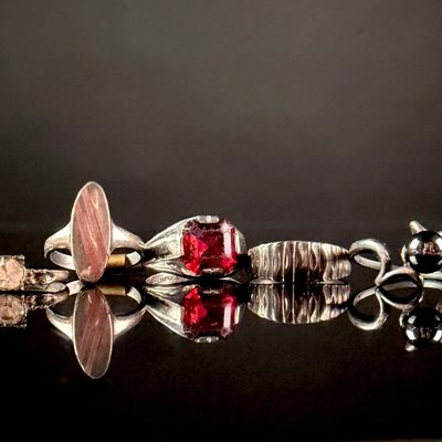 A Collection of Six Vintage and Modernist Sterling Silver and Gemstone Rings