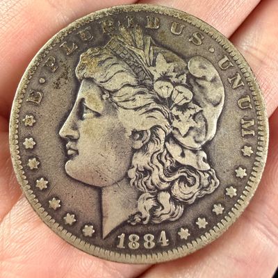 Sale Photo Thumbnail #177: US 1884-O Morgan Silver Dollar