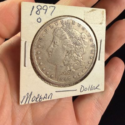Sale Photo Thumbnail #165: 1897-O Morgan Silver Dollar