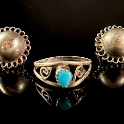A Trio of Sterling Silver Jewelry Including a Turquoise Ring and a Pair of Domed Earrings