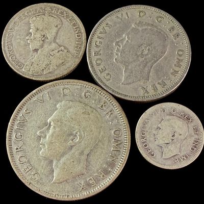Sale Photo Thumbnail #187: A Group of Four UK and Canada Silver and Cupro-Nickel Coins, 1920-1948