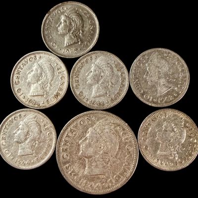 A Collection of Seven Dominican Republic 10 and 25 Centavos Coins