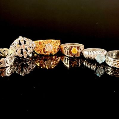 A Collection of Ten Assorted Sterling Silver and Fashion Rings