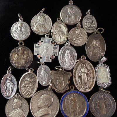 Sale Photo Thumbnail #101: A Collection of 20 Vintage Catholic Devotional Medals and Pendants
