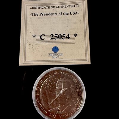 Sale Photo Thumbnail #137: American Mint 2001 Liberia $10 George W. Bush Commemorative Coin