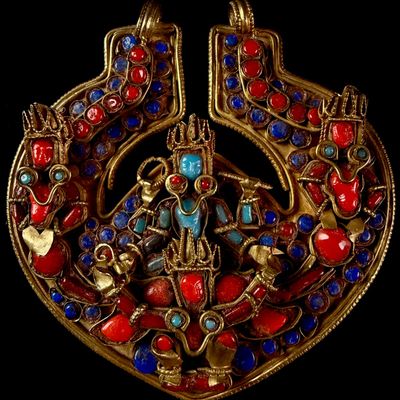 A Large Nepalese Gilded Metal Pectoral Pendant Set with Coral Turquoise and Lapis Lazuli