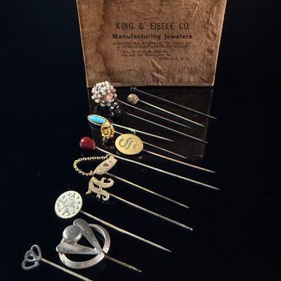 Sale Photo Thumbnail #184: A Collection of Thirteen Antique and Vintage Stick Pins with King and Eisele Co. Box