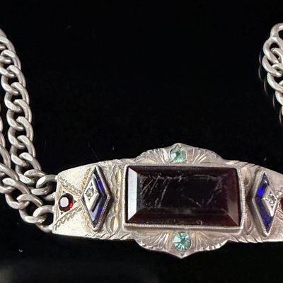 A Vintage Silver and Multi-Stone Decorative Panel Bracelet with Enamel Accents
