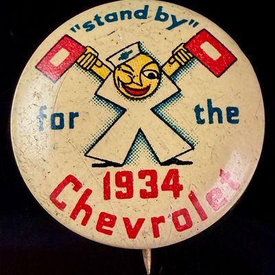 1934 Chevrolet Stand By Advertising Pinback Button by St. Louis Button Co.