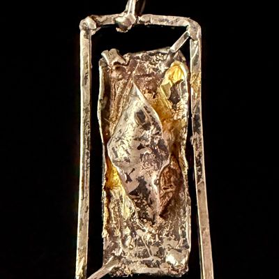 A Brutalist Style Rectangular Pendant Brooch in Silver and Gold Toned Metal