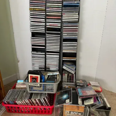Large Collection Of CDs And Tapes