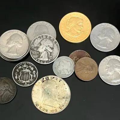 Antique and Vintage U.S. Coins with Silver Franklin Half, 1968 Quarter, 1882 Five Cent Piece