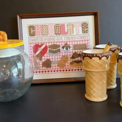 “Chocolate” Needlepoint Picture, Ceramic Cone Dishes And Glad And Ceramic Cookie Jar