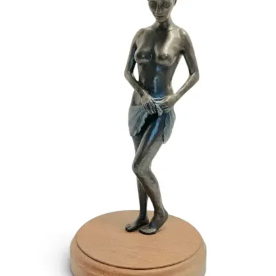 Bronze Sculpture of Woman on Rotating Wood Base - Signed  (9" x 19")