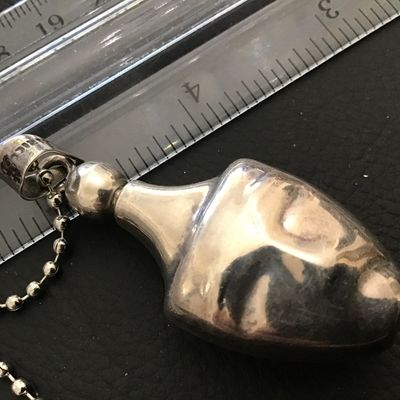 Sale Photo Thumbnail #197: See attached. Chain is not Silver Just Pendant