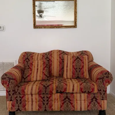 Traditional Damask Loveseat With Accent Pillows & Ornate Gold-Tone Wall Mirror