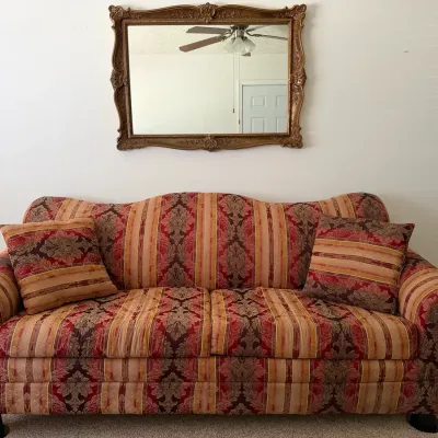 Traditional Damask Sofa With Accent Pillows & Ornate Wall Mirror