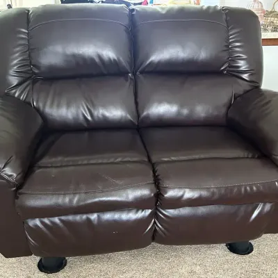 Ashley Furniture Power Reclining Faux Leather Loveseat