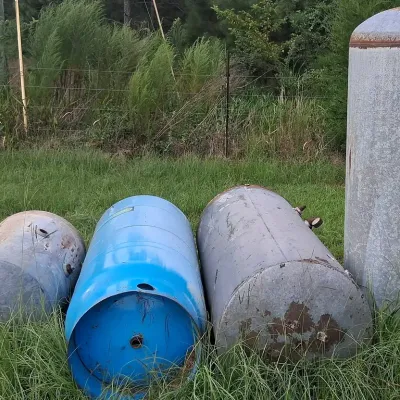 Four Galvanized Metal Water Tanks