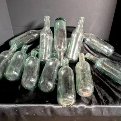 Hand-Blown Green Glass Torpedo Bottles