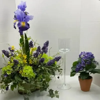 Purple Floral Arrangements with Tall Candlestick Holder
