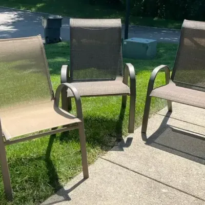 Three Woven Sling-seat Patio Chairs
