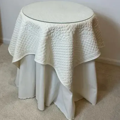 Round Glass-Top Accent Table with Quilted Cover