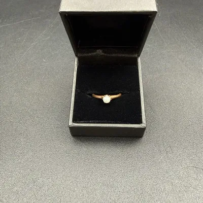 A Single Pearl Set In 14k Gold Ring