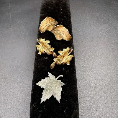 Leaf Motif Lot Featuring A Pair Of Leaf Shaped Trifari Clip-On Earrings