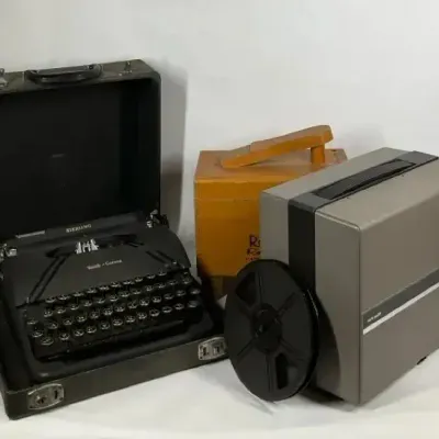 Vintage Sterling Portable Typewriter & Bell & Howell Portable Film Projector