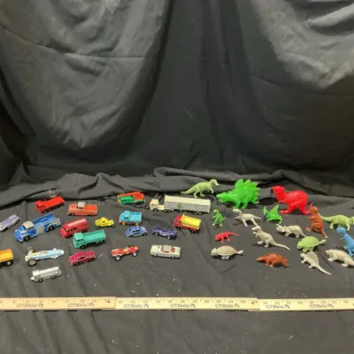 Antique Cars and Dinosaur Figurines 