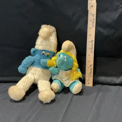 Two Smurf Stuffed Animals