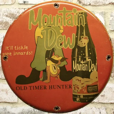 Sale Photo Thumbnail #39: 12" Mountain Dew It'll Tickle Your Innards Porcelain Sign