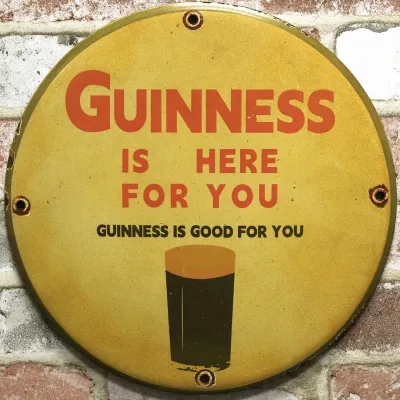 Sale Photo Thumbnail #32: 12" Guinness Is Good For You Porcelain Sign