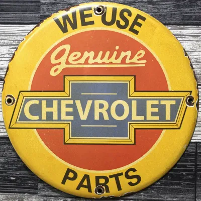 Sale Photo Thumbnail #71: We Use Genuine Chevrolet Parts Porcelain Sign - Second View