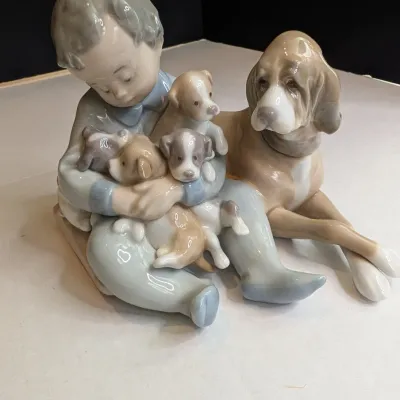 1988 Lladro Figurine "New Playmates" Boy With Dog & Puppies #5456 Stands 5" Tall x 5 1/2" Long #67