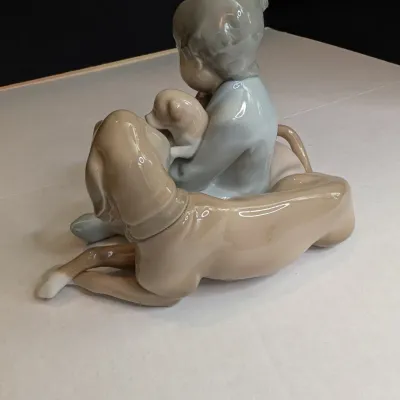 1988 Lladro Figurine "New Playmates" Boy With Dog & Puppies #5456 Stands 5" Tall x 5 1/2" Long #67