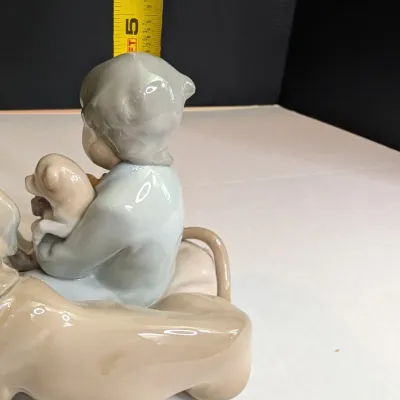 1988 Lladro Figurine "New Playmates" Boy With Dog & Puppies #5456 Stands 5" Tall x 5 1/2" Long #67