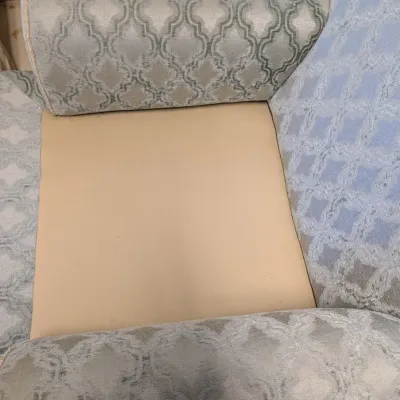 Upholstered Armchair with Trellis Pattern and Pleated Skirt