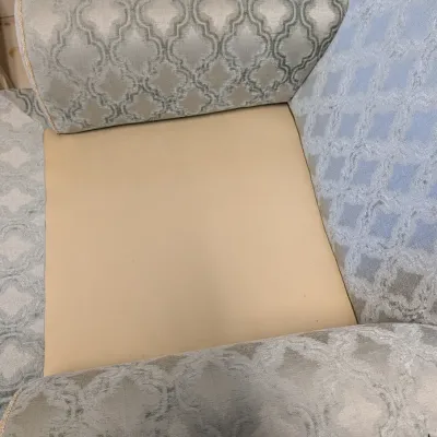 Upholstered Armchair with Trellis Pattern and Pleated Skirt