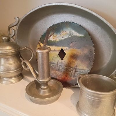 Pewter chamberstick, painted saw blade art, pewter tray