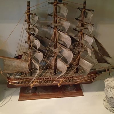 Wood clipper ship model on stand