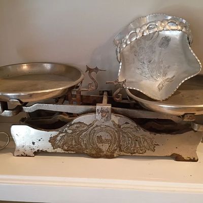 Vintage balance scale with brass pans