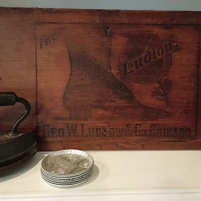 Antique wood advertising crate panel, cast iron sad iron