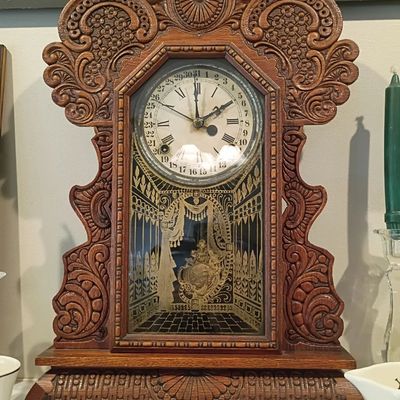 Carved oak gingerbread kitchen clock
