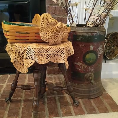 Antique piano stool with claw feet, Longaberger basket, painted metal crock