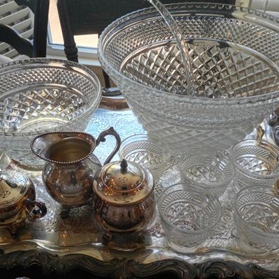 Cut glass punch bowl, silverplate tea set on tray