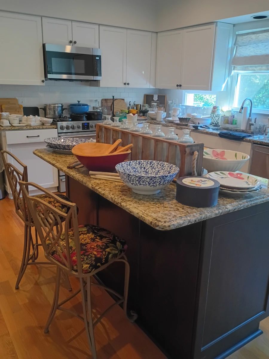 Kitchen island with metal barstools, kitchenware