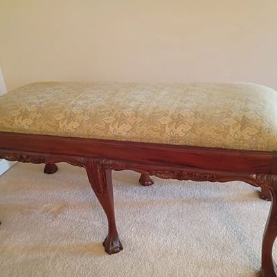 Upholstered bench, carved legs with claw feet
