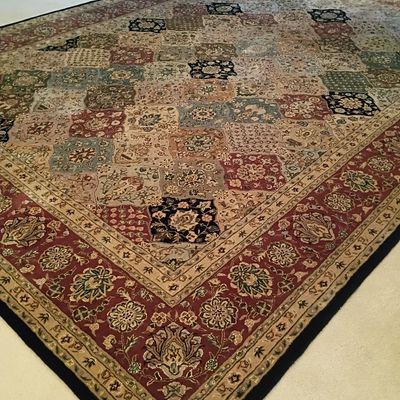 Persian-style panel design area rug
